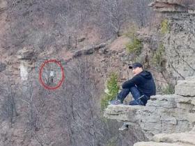 悬崖峭壁现人影 惊似失踪登山客